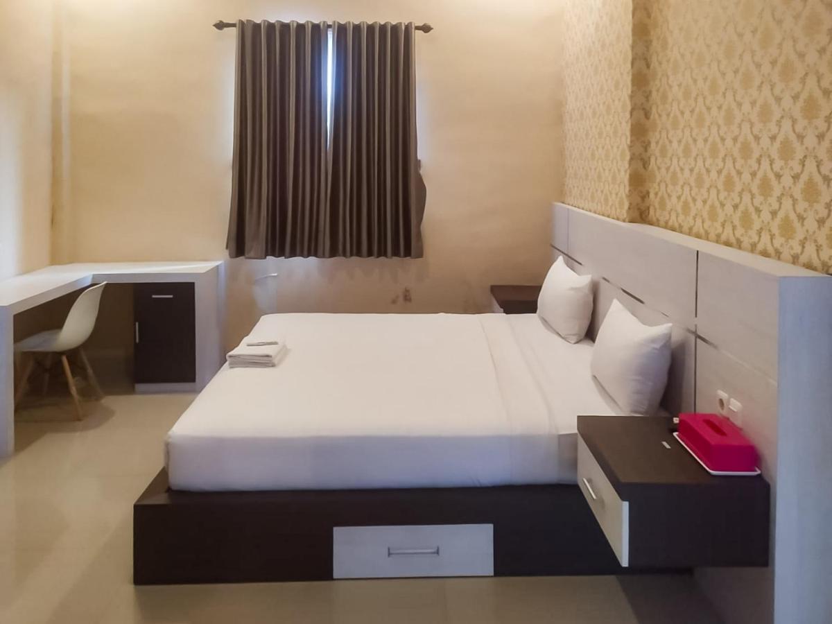 Hotel Reddoorz Syariah Near Sultan Syarif Kasim II Airport Pekanbaru Esterno foto