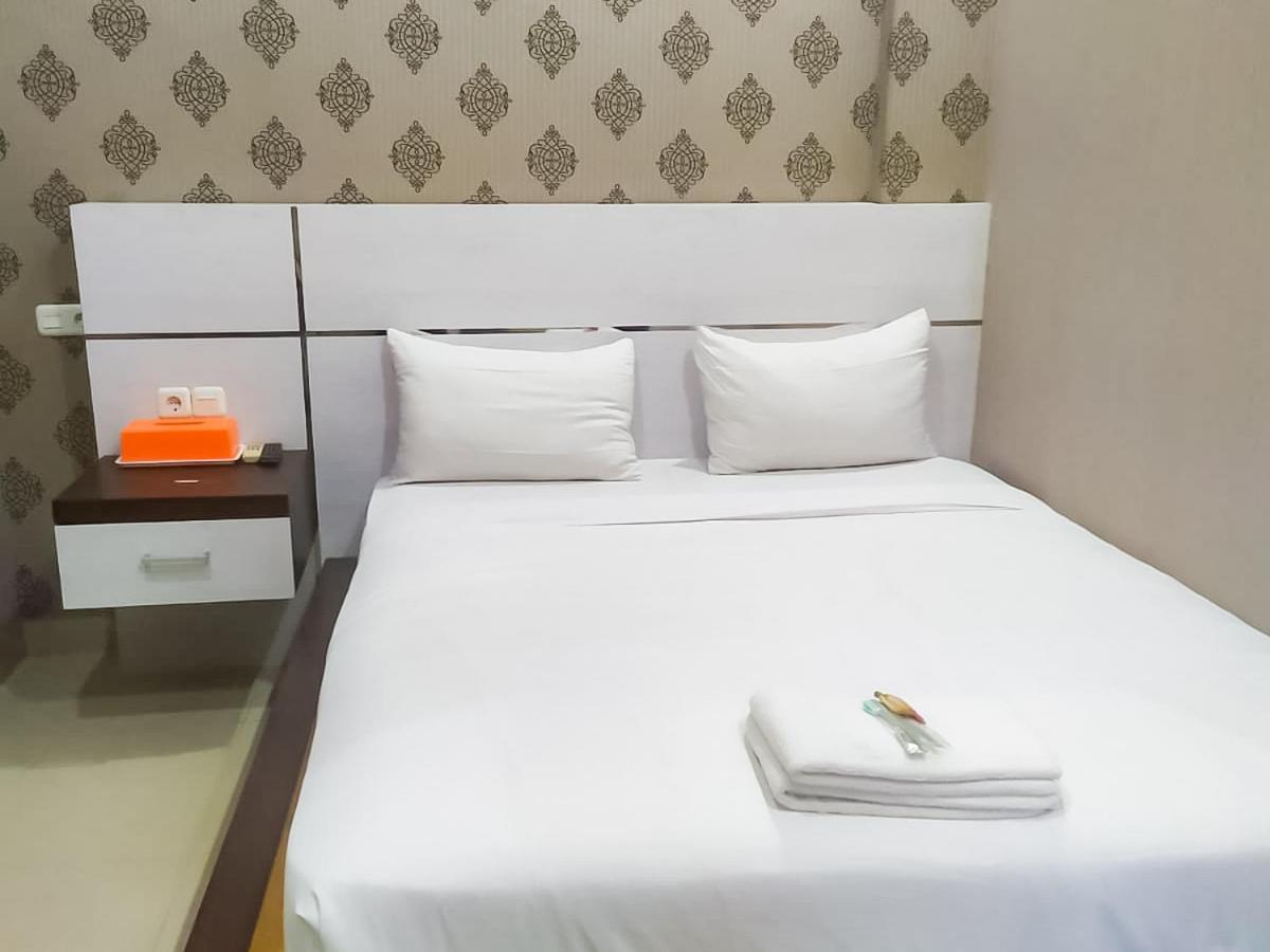 Hotel Reddoorz Syariah Near Sultan Syarif Kasim II Airport Pekanbaru Esterno foto